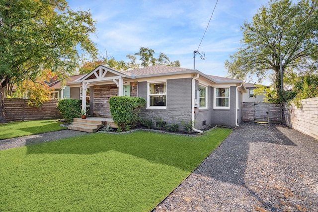 bungalow with a front lawn