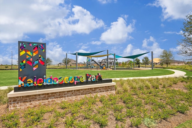 exterior space with a playground and a yard