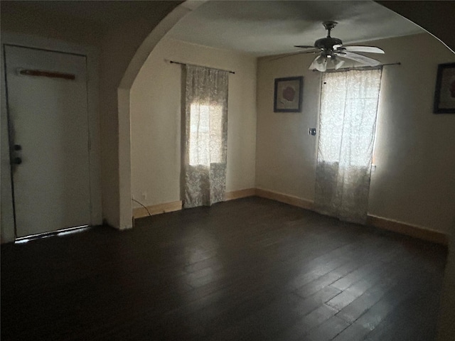 unfurnished room featuring ceiling fan and wood-type flooring