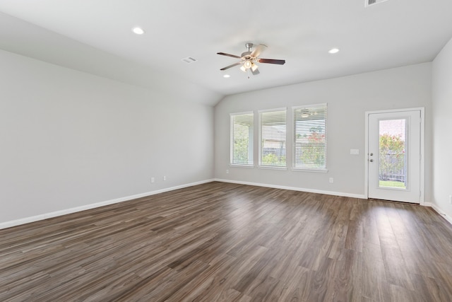 unfurnished living room featuring dark wood-type flooring, ceiling fan, and lofted ceiling