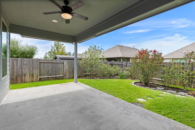 view of patio featuring ceiling fan