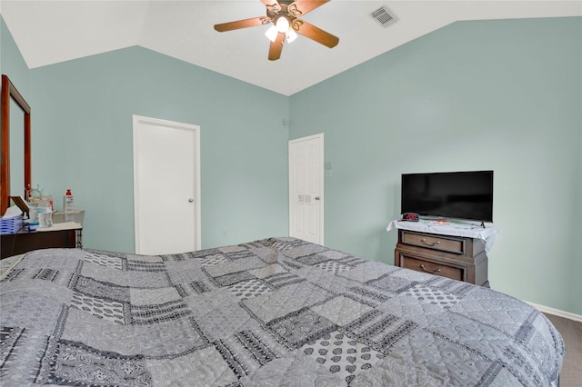 carpeted bedroom featuring vaulted ceiling and ceiling fan