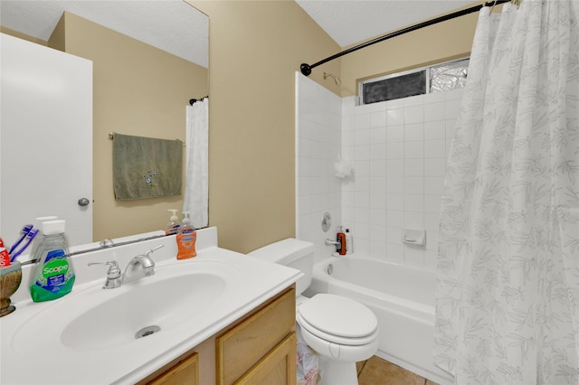 full bathroom featuring vanity, shower / bath combination with curtain, a textured ceiling, tile patterned floors, and toilet