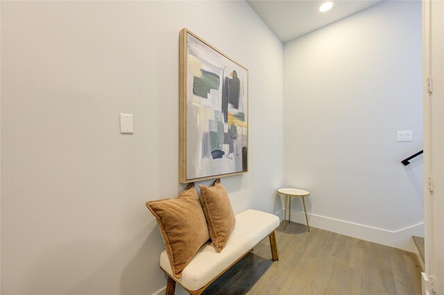 living area with light hardwood / wood-style flooring