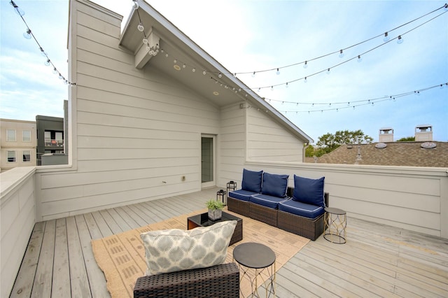 wooden terrace featuring outdoor lounge area