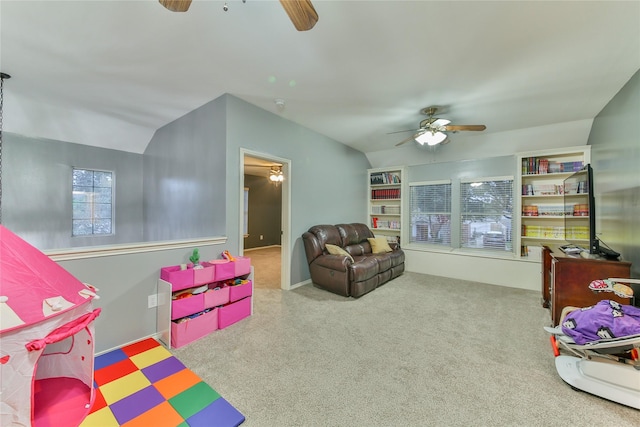 game room featuring vaulted ceiling, carpet flooring, and ceiling fan