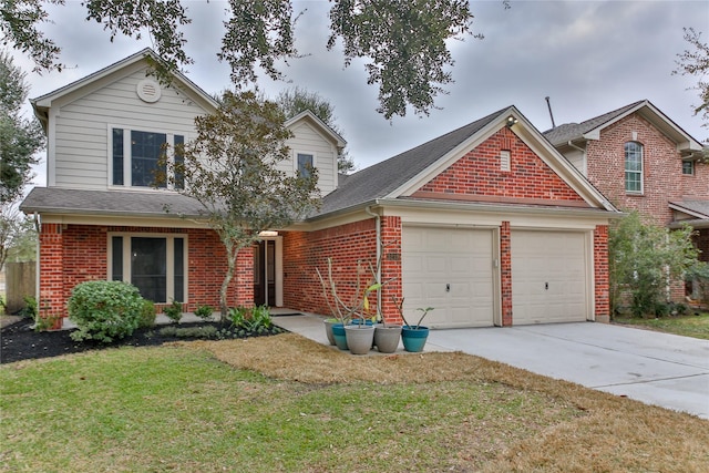 view of front of property with a garage and a front yard