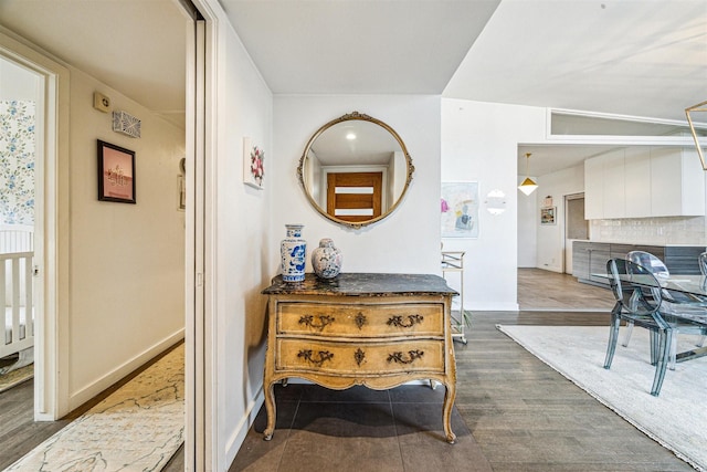 corridor featuring dark wood-type flooring