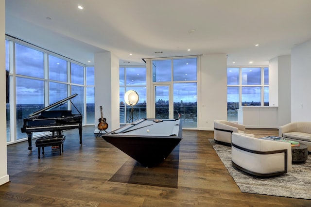 rec room featuring expansive windows, billiards, and dark hardwood / wood-style floors