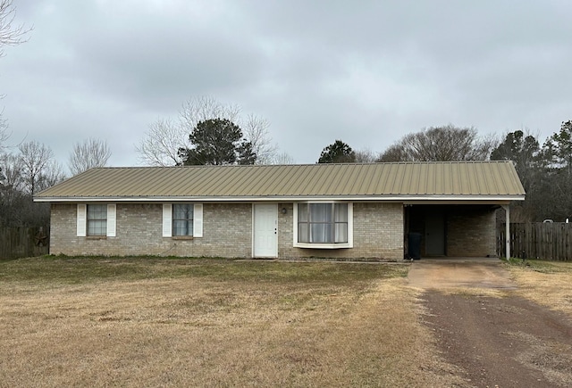 single story home with a carport and a front yard