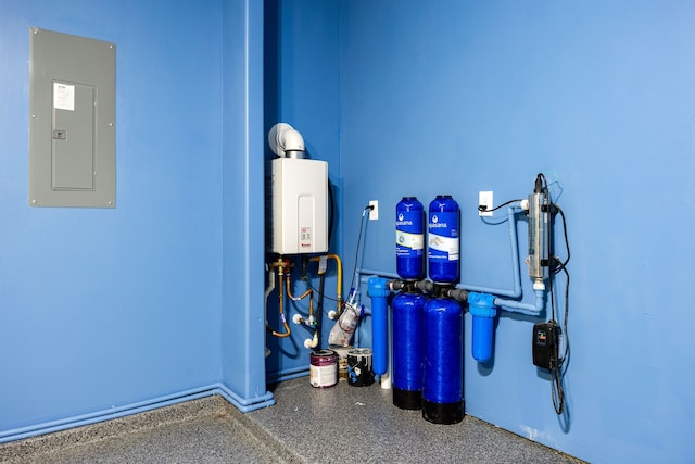 utility room with electric panel and tankless water heater