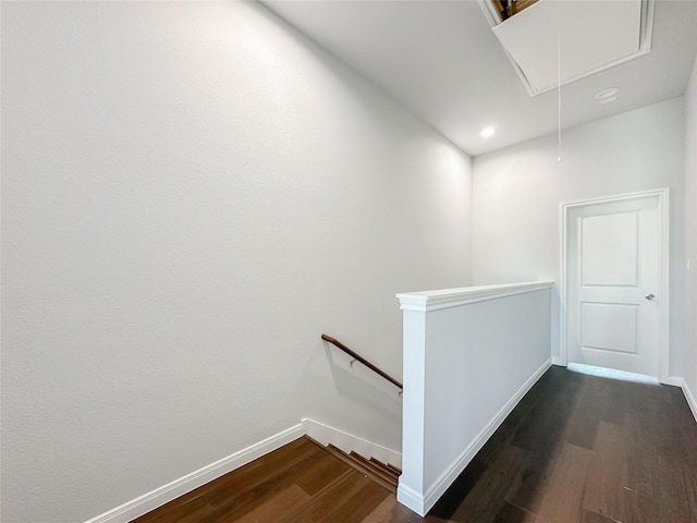 hallway featuring dark hardwood / wood-style floors