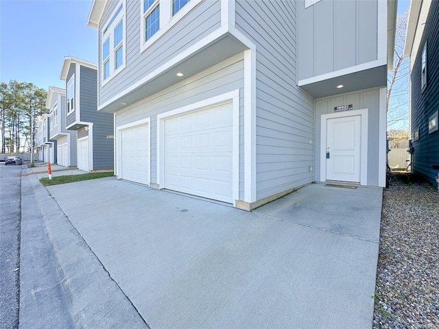 view of exterior entry featuring a garage