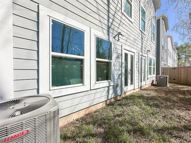 view of side of property featuring cooling unit