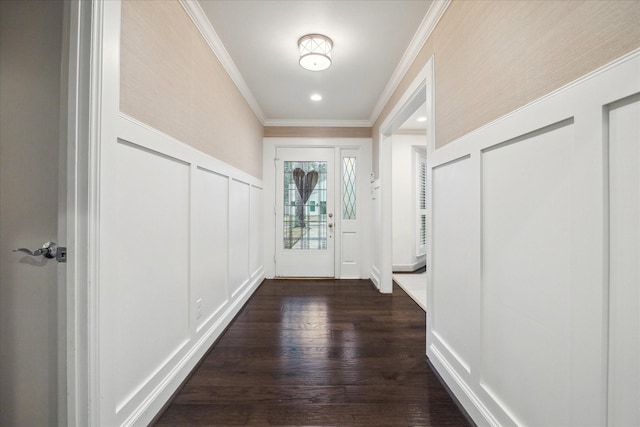 doorway to outside with ornamental molding and dark wood-type flooring