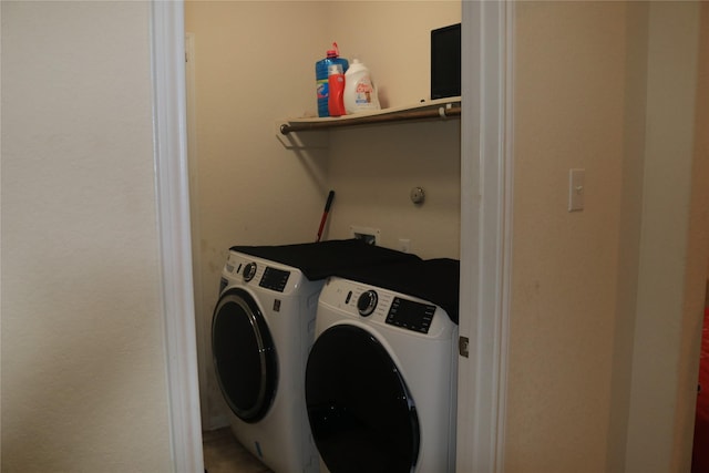 laundry room with washer and dryer