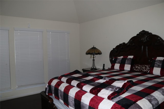 bedroom with vaulted ceiling