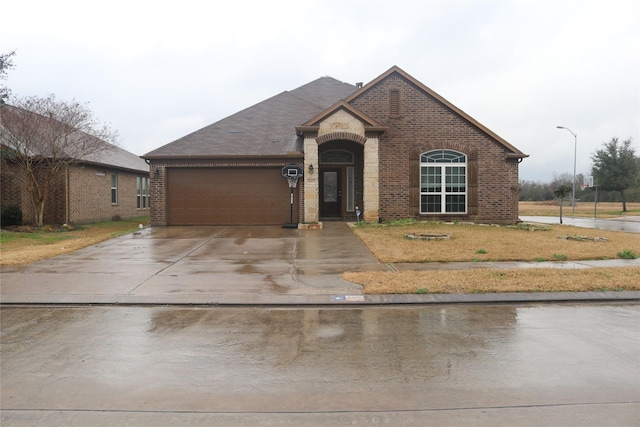 view of front of property with a garage