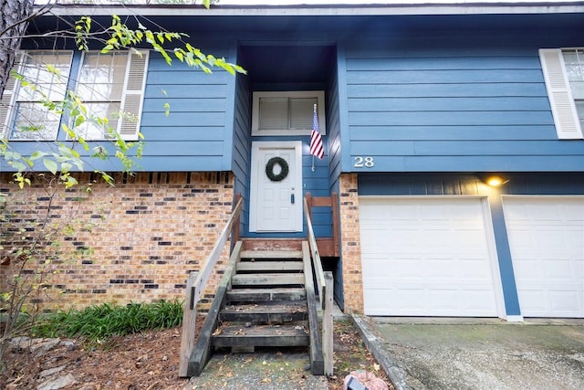 property entrance featuring a garage