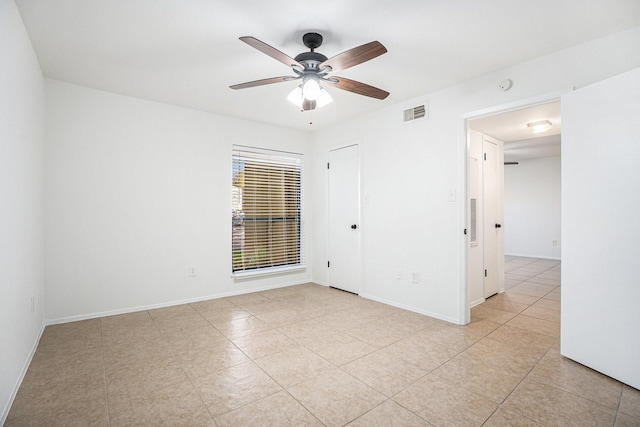 spare room featuring ceiling fan