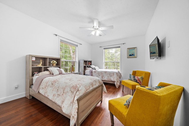 bedroom with dark wood-type flooring and ceiling fan