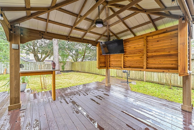 wooden terrace with a yard, a gazebo, and ceiling fan