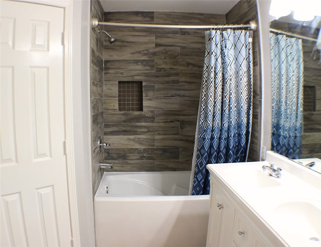 bathroom with shower / tub combo with curtain and vanity