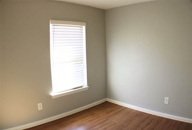 empty room featuring hardwood / wood-style floors