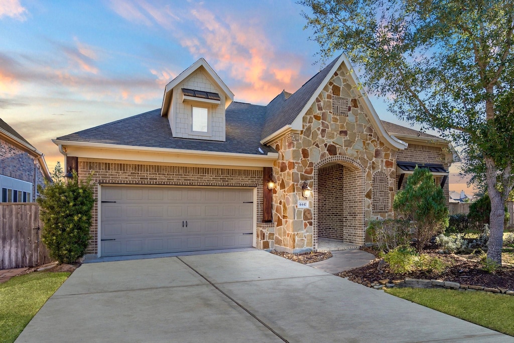 view of front of home with a garage