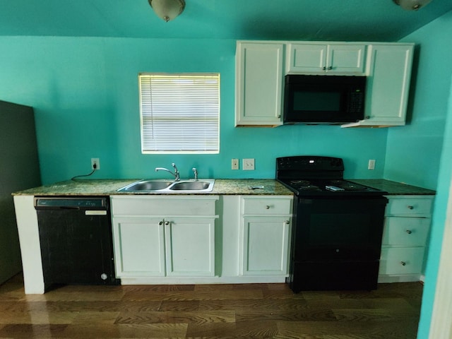 kitchen with sink, dark wood-type flooring, black appliances, and white cabinets