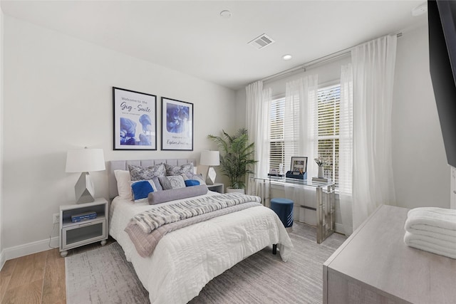 bedroom featuring light hardwood / wood-style flooring