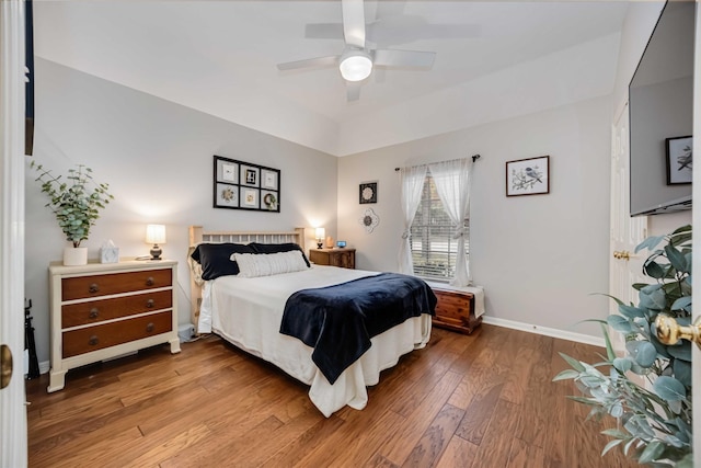 bedroom with ceiling fan and hardwood / wood-style floors