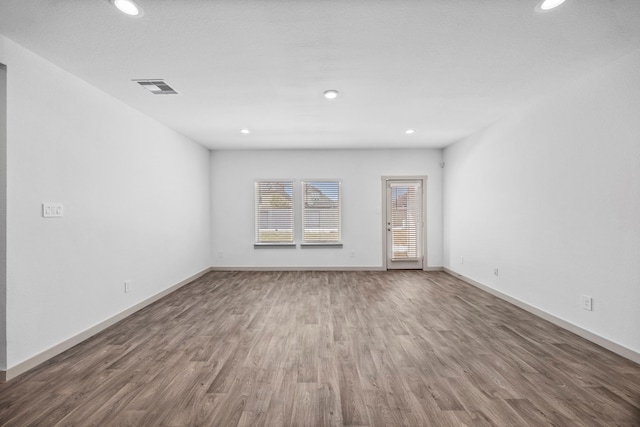 interior space with hardwood / wood-style floors