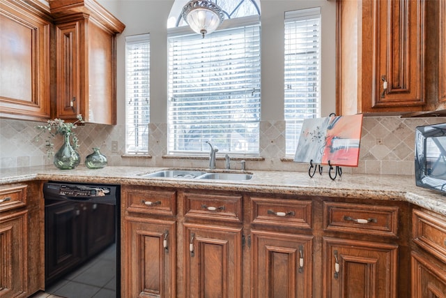 kitchen with light tile patterned flooring, sink, tasteful backsplash, and black appliances