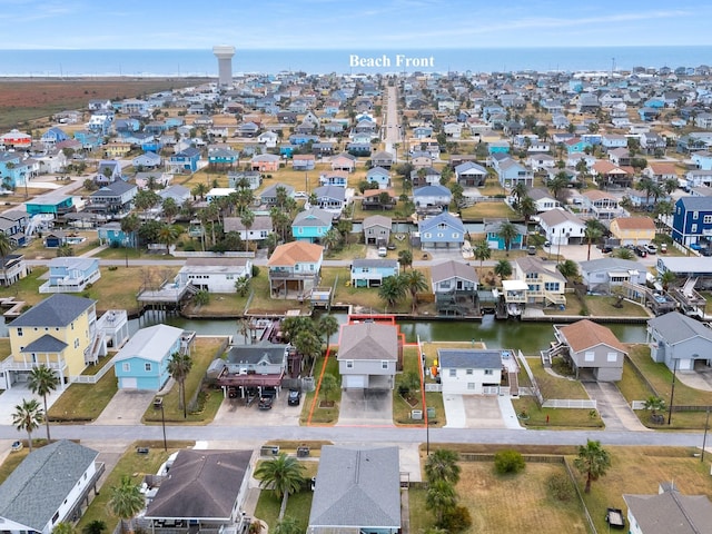 16527 Nassau Way, Jamaica Beach, TX 77554 - drone / aerial view with a residential view and a water view