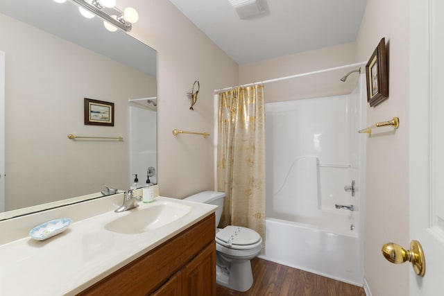 16527 Nassau Way, Jamaica Beach, TX 77554 - bathroom with vanity, toilet, visible vents, shower / bath combination with curtain, and wood finished floors