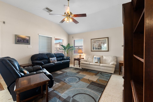 16527 Nassau Way, Jamaica Beach, TX 77554 - living area with visible vents, lofted ceiling, ceiling fan, and carpet flooring