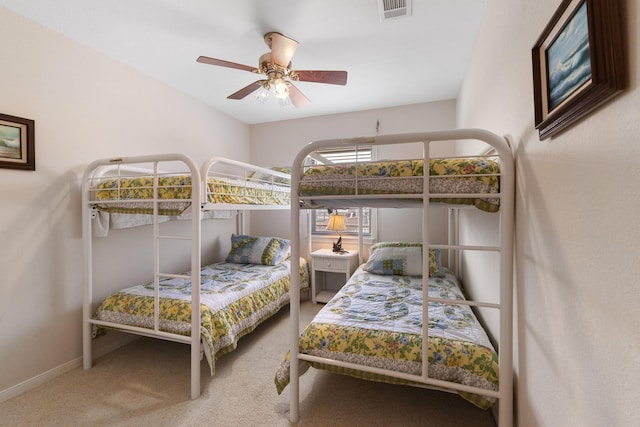 16527 Nassau Way, Jamaica Beach, TX 77554 - carpeted bedroom featuring baseboards, ceiling fan, and visible vents