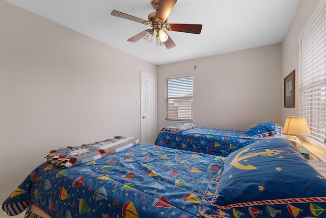 16527 Nassau Way, Jamaica Beach, TX 77554 - bedroom with a ceiling fan