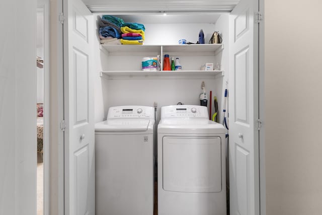 16527 Nassau Way, Jamaica Beach, TX 77554 - clothes washing area featuring washing machine and dryer and laundry area