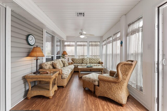 16527 Nassau Way, Jamaica Beach, TX 77554 - sunroom / solarium with visible vents, ceiling fan, and wood finished floors