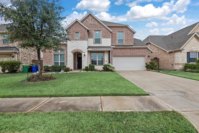 view of front of home featuring a garage and a front lawn