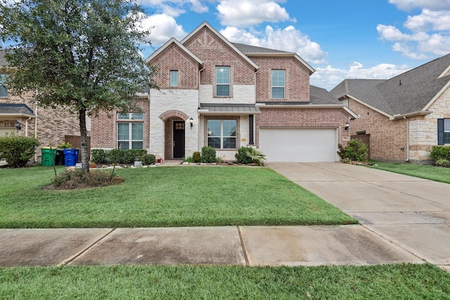 view of front facade with a garage and a front lawn