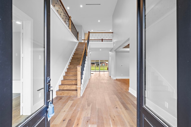 foyer with light hardwood / wood-style floors