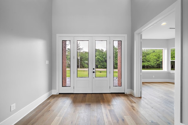 doorway to outside featuring light hardwood / wood-style floors