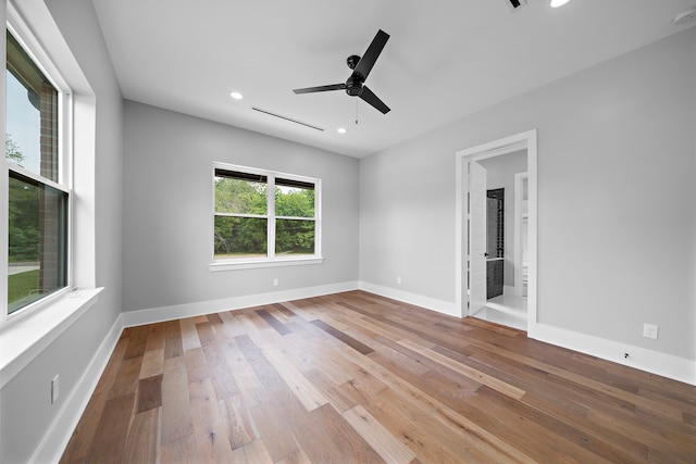 unfurnished room featuring ceiling fan and light wood-type flooring