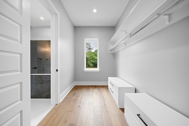 walk in closet featuring light wood-type flooring