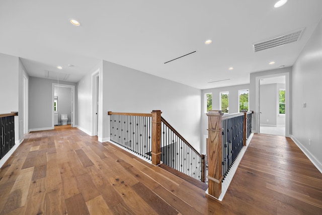 hallway featuring wood-type flooring