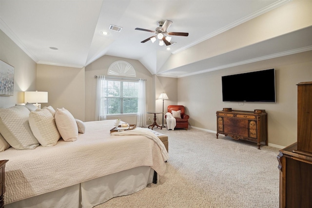 carpeted bedroom featuring vaulted ceiling, crown molding, and ceiling fan