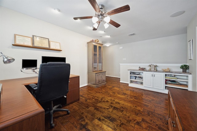 office featuring dark wood-type flooring and ceiling fan